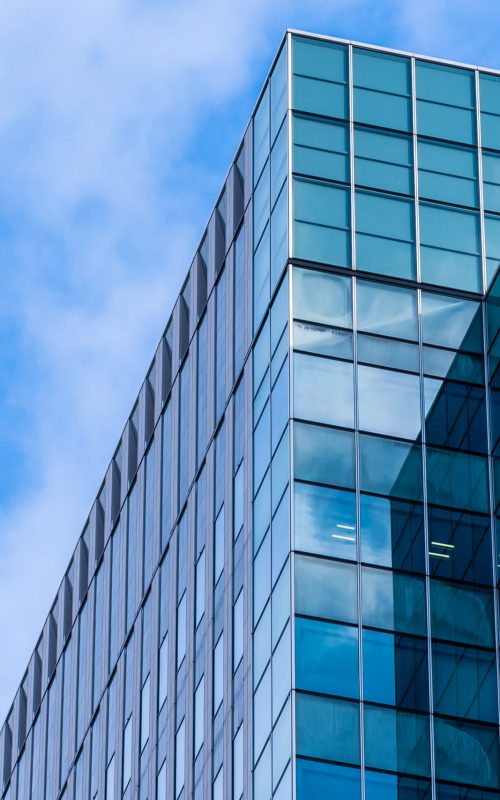 Beautiful architecture skyscraper office business building with glass window shape